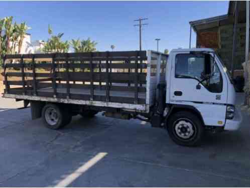 2007 Isuzu NQR flatbed with stakes