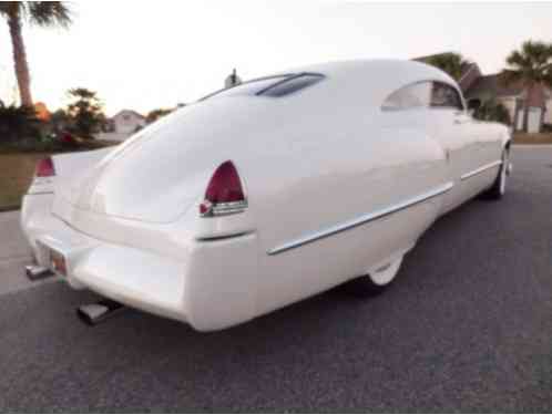 1949 Cadillac Series 62 Peach burlap w/ white vinyl