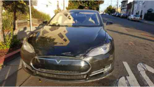 Tesla Model S with battle damage (2013)