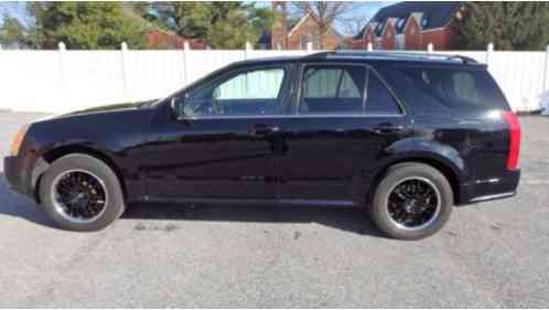 2005 Cadillac SRX 4 new custom black wheels