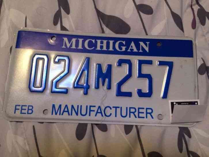 White On Blue Michigan Manufacturer Plate License Plate